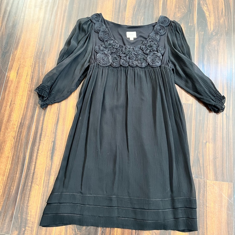 Elegant Black Dress with Floral Accents